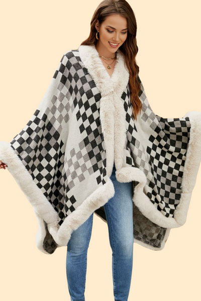 Ivory checkered poncho by. HauteKopal